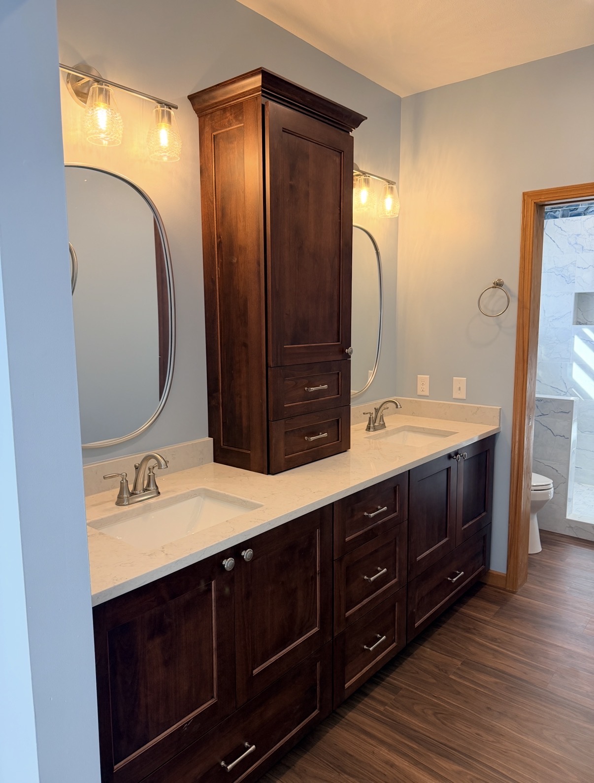 Bathroom vanity with dark wood