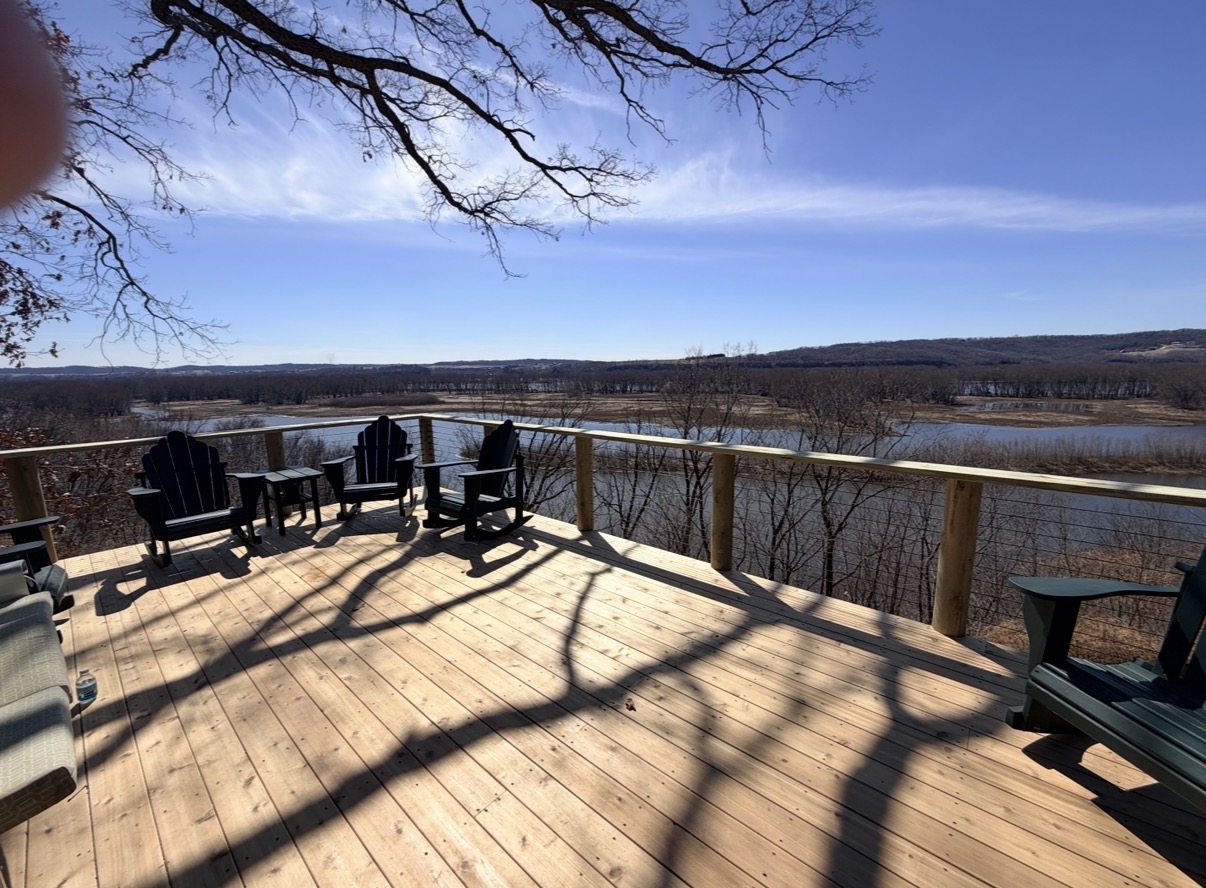 Large custom deck overlooking the river